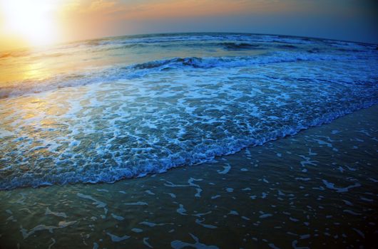 Colorful seascape during sunset. Natural darkness added