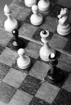 Old wooden chess. Monochrome close-up photo