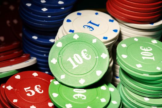 Stack of European casino chips. Close-up photo