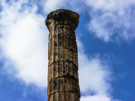 Rural Greek Delphi Pillar at sky background