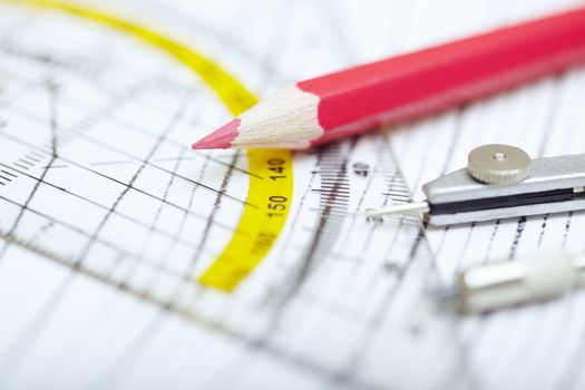 Scheme with compasses rulers and pencil. Close-up photo