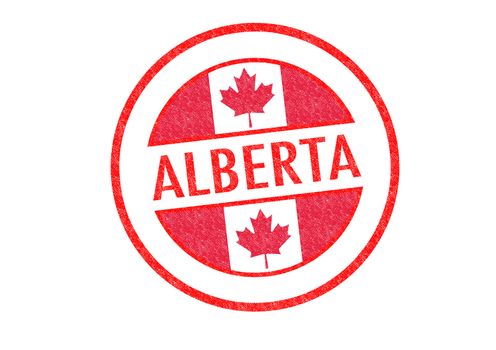 Passport-style ALBERTA rubber stamp over a white background.