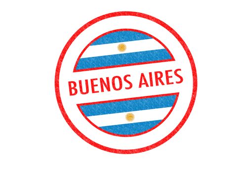 Passport-style BUENOS AIRES rubber stamp over a white background.