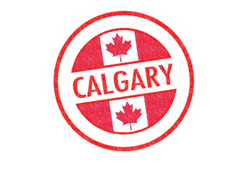 Passport-style CALGARY rubber stamp over a white background.