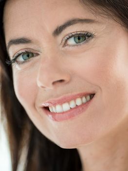 Portrait of an attractive woman in her forties with a perfect smile