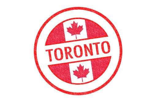 Passport-style TORONTO rubber stamp over a white background.