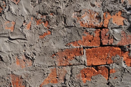 Fragment of rough red brick wall surface