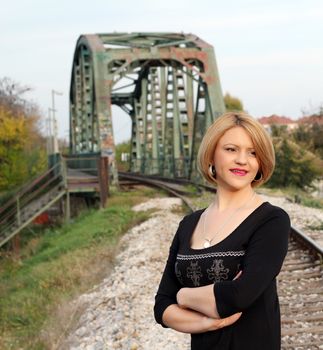 beautiful woman on railroad portrait