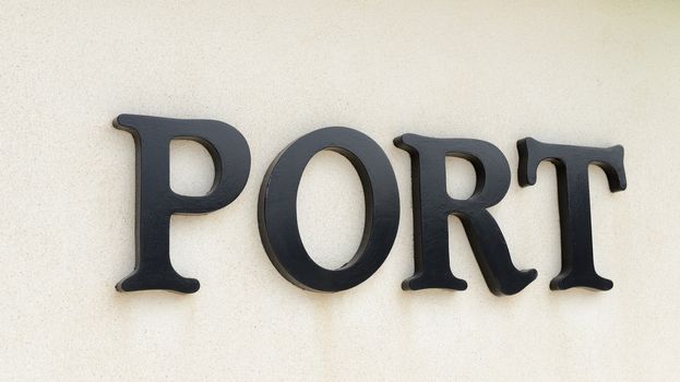 text sign of port in black