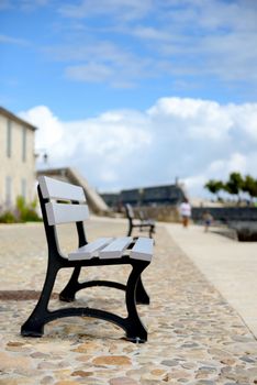 tranquil scene of empty benches on a sunny day