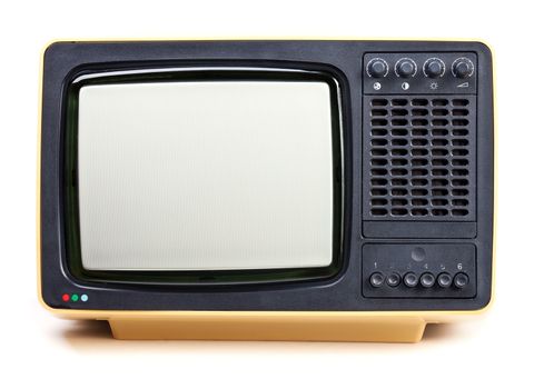 Vintage yellow television set on white background