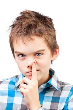 Portrait of a boy picking his nose