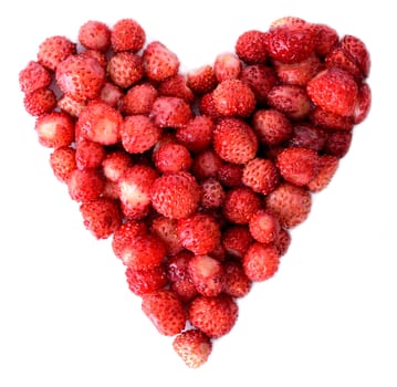 wild strawbeeries in the heap of a heart isolated on white