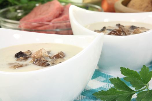 fresh Veal soup with mushrooms and parsley