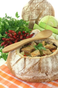 a farmhouse bread stuffed with a colorful bread soup