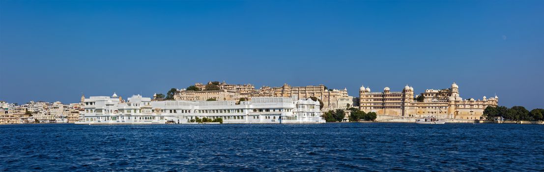 India luxury romantic travel tourism concept background - panorama of Lake Pichola, Lake palace and City Palace. Udaipur, India