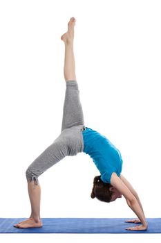 Yoga - young beautiful woman  yoga instructor doing Wheel Pose with one leg lifted straight up (Eka Pada Chakrasana) exercise isolated on white background