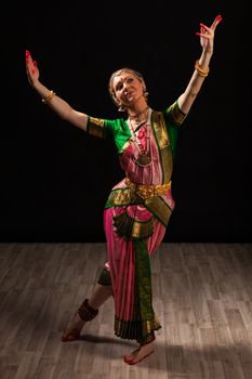 Young beautiful woman dancer exponent of Indian classical dance Bharatanatyam