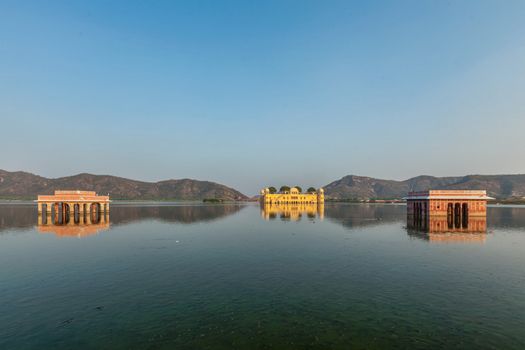 Rajasthan landmark - Jal Mahal (Water Palace) on Man Sagar Lake on sunset.  Jaipur, Rajasthan, India