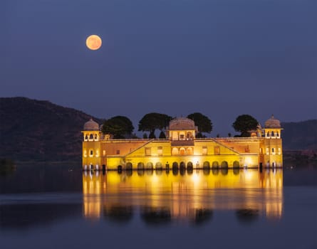 Rajasthan landmark - Jal Mahal (Water Palace) on Man Sagar Lake in the evening in twilight.  Jaipur, Rajasthan, India