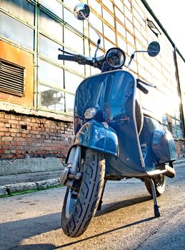 Budapest, HUNGARY - JULY 09: Old Vespa scooter parked in a street in Budapest, Hungary on July 09, 2013