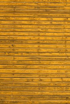 Background picture made of old yellow wood boards