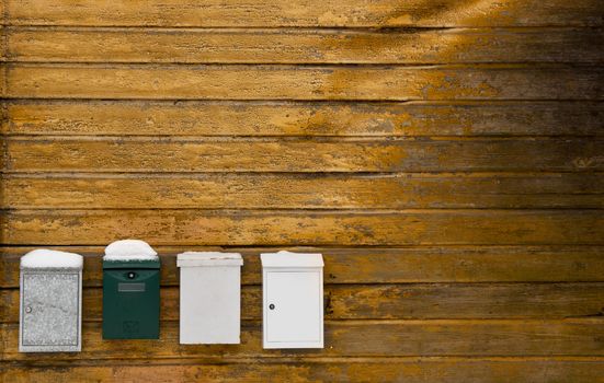 Background picture of a wood wall with mailboxes