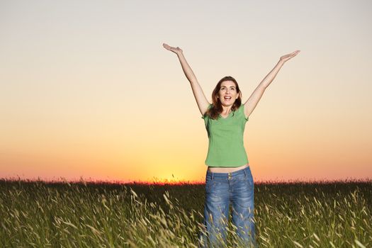 Outdoor portrait of a woman on a meadow releaxing