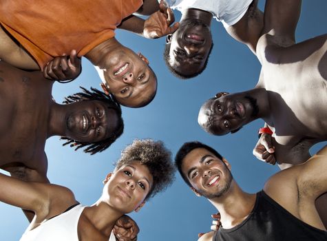 Group portrait of male and female young people in outdoor