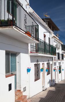 Typical white houses in  the narrow street of Mijas - Andalusia, Spain