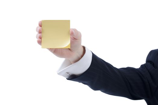 businessman holding a yellow stick reminder note isolated on white background