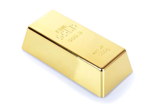 Single gold bullion igot on white background