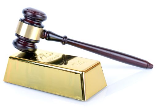 Price of gold gold bullion bar and gavel on white background