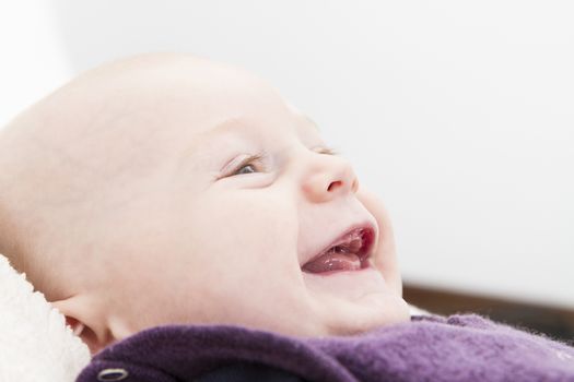 12 week old toddler smiling in horizontal image