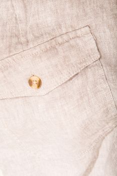 Closeup of a pocket of some textile trousers.