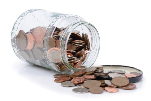using the rainy day fund, coins spilling out of a jar
