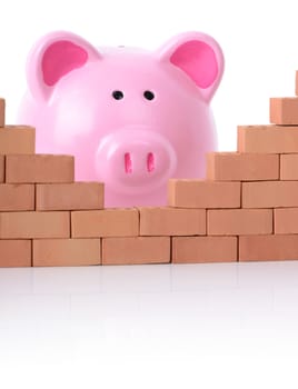 concept piggy bank breaking down the walls of finance