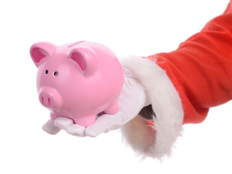 Sant handing out a coin piggy bank concept of christmas savings isolated on a white background