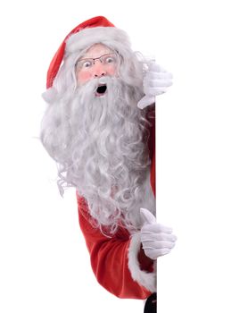 Santa claus peeking from behind a side frame isolated on white