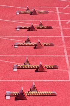 Starting metal blocks on runway, sports equipment