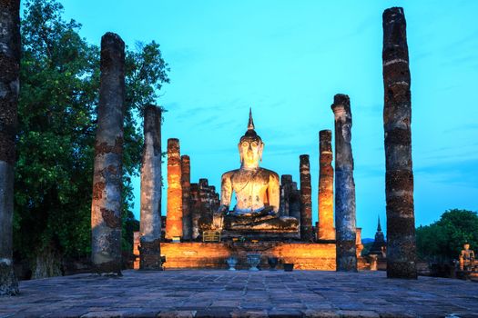 Sunrise Twilight Buddha Statue in Wat Mahathat Temple in Sukhothai Historical Park Thailand