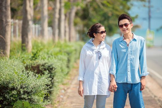 Happy Young Adult Couples walking together