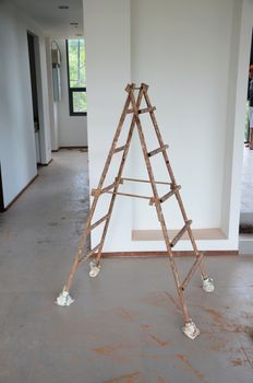 Grunge stepladder in construction site