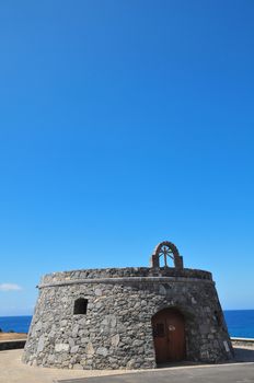 Gray Textured Bunker on a Blue Sky in Spain