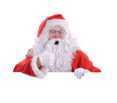 Santa poping up behind white copy space with a thumbs up you have been good, isolated on a white background
