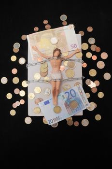 Jesus Christ and Money on a Dark Background - Religion Concept