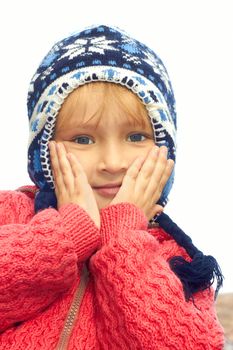 Beautiful small Caucasian girl outdoors portrait in autumn time