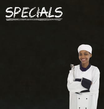 African American woman chef with chalk specials sign on blackboard background