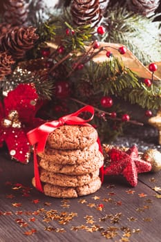 Christmas cookies on the table with red ribbon