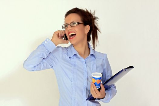 portrait of young businesswoman talking on cell phone
